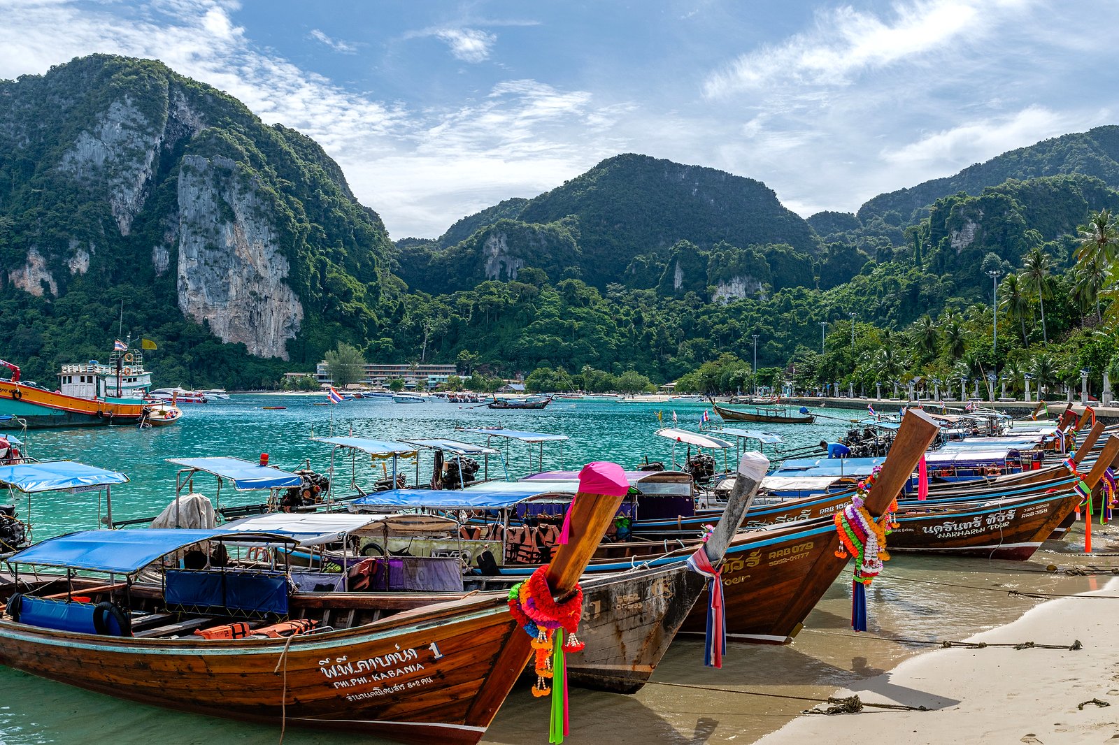 Traditional longtail boats at the Phi Phi Islands, on the Bangkok and Phuket tour